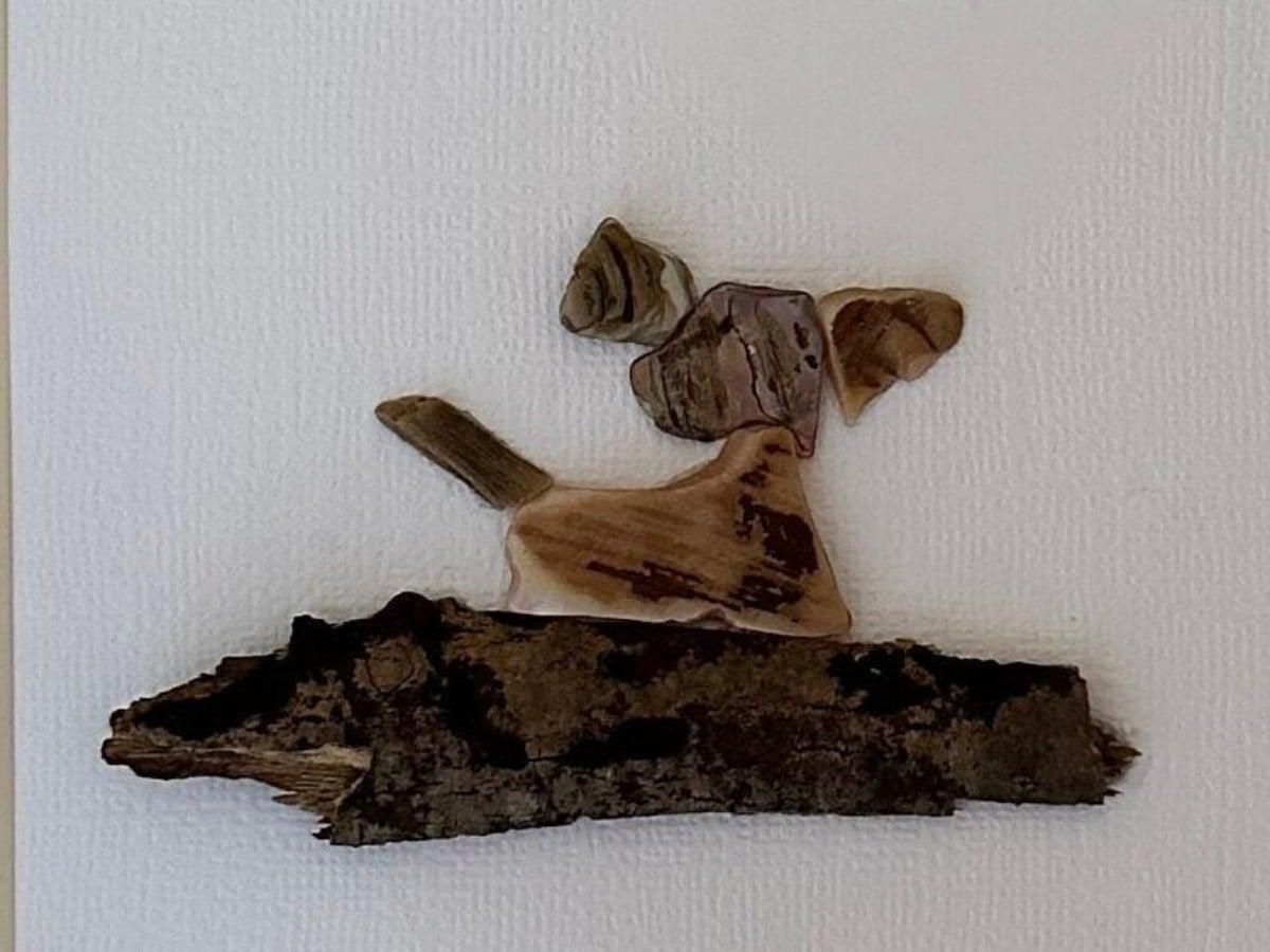 My pebble and shell picture of a puppy
